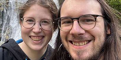 Max Heisinger and partner Simone Heisinger smiling at the camera.