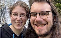 Max Heisinger and partner Simone Heisinger smiling at the camera.