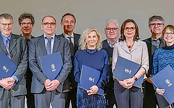 Sepp Hochreiter with the other members of Leopoldina smiling into the camera.