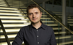 Dan Alistarh smiling in the camera.