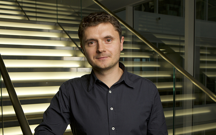 Dan Alistarh smiling in the camera.